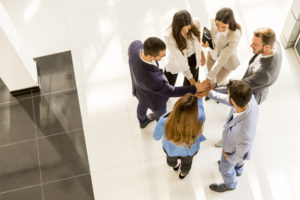 Group of young business people in the modern office, viewed from above